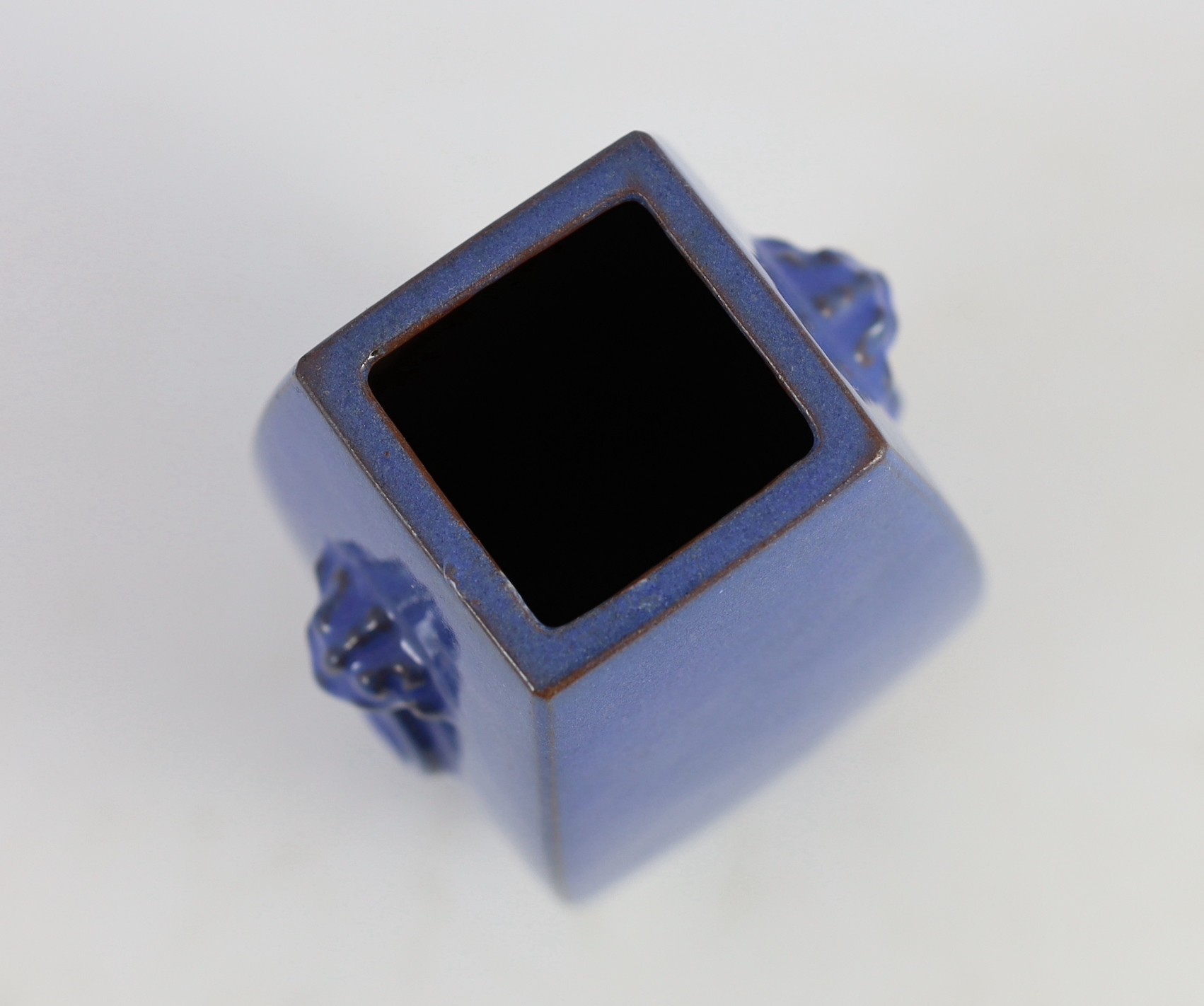 A Chinese Yixing blue glazed square vase, 19th/20th century, 16.2cm high